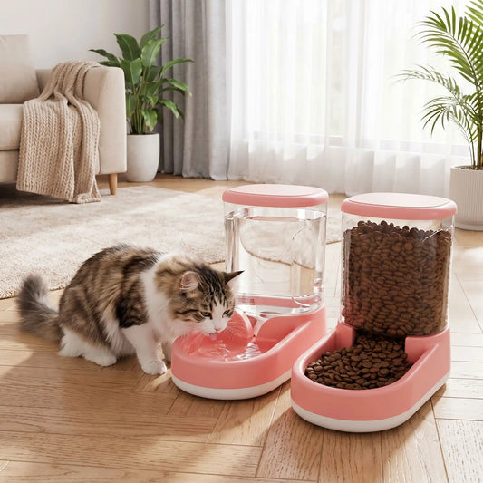  chat qui utilise son distributeur de croquettes pour chat et eau AutoFeeder-XL rose